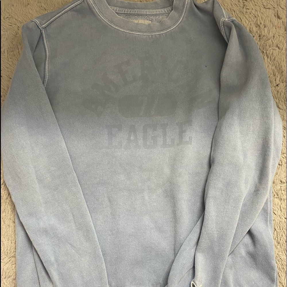this is a blue american eagle crew neck